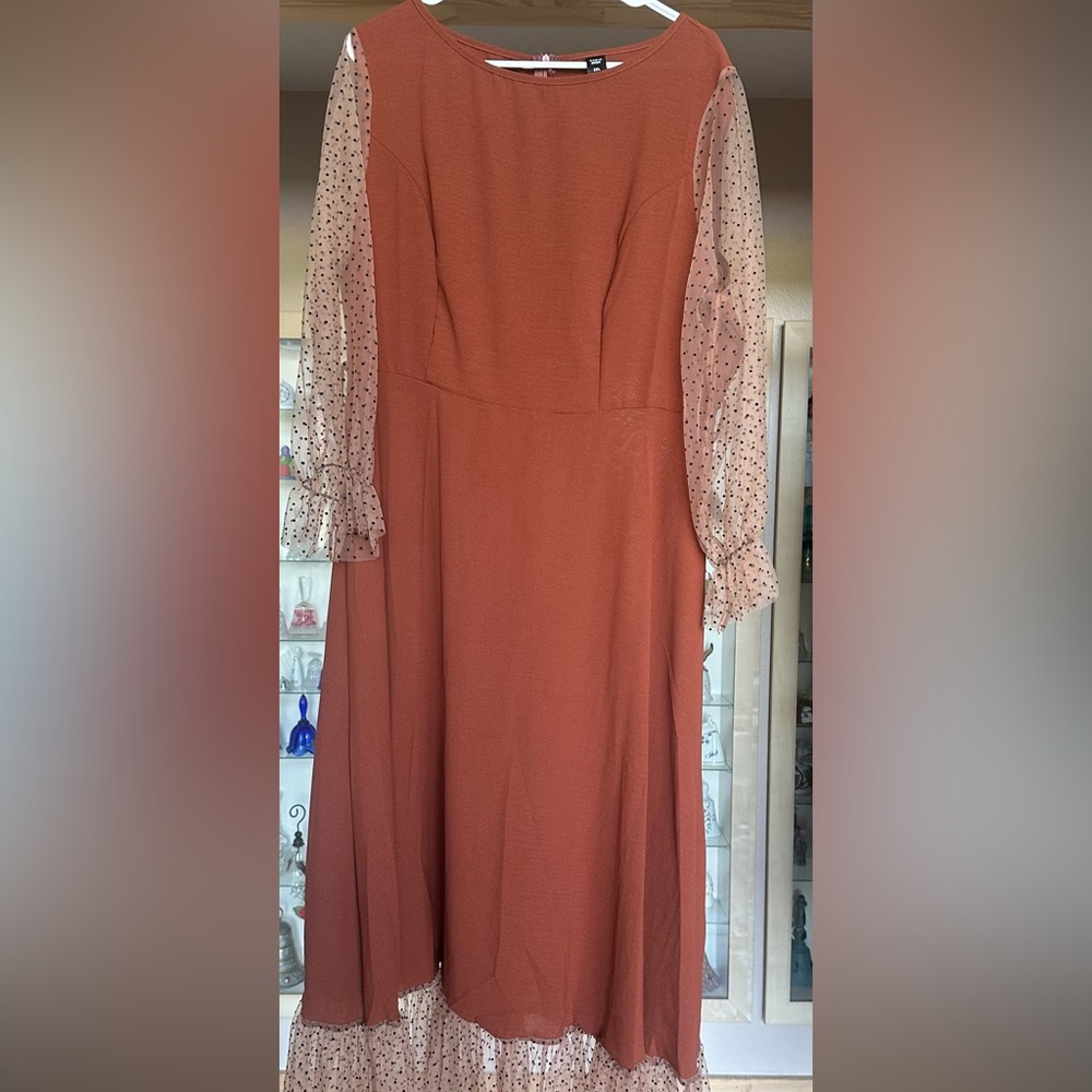 Elegant Rust Dress with Sheer Polka Dot Sleeves